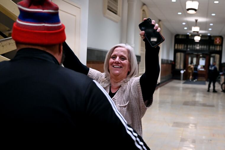 City Commissioner and chair of the Board of Elections Lisa Deeley (right) reacts with Vice Chair, City Commissioner Omar Sabir as the office door is closed at City Hall at 5 p.m.