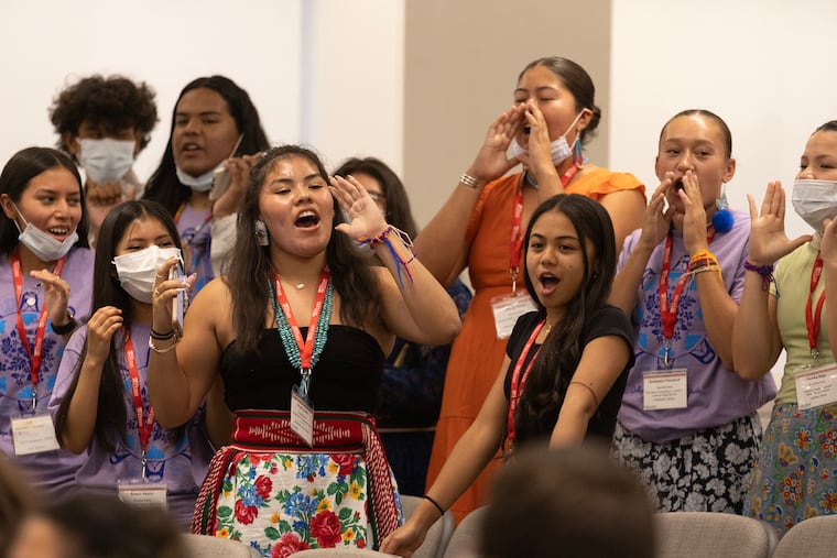 Students in College Horizons present pieces of their Native heritage at the program's closing ceremonies and "traditional night". Niayla Curley, a member of Navajo nation, is left center, and Rhacelyn Respicio, a Native Hawaiian, is right center. Native students from across the country came to the University of Pennsylvania for College Horizons to learn about the college admissions process.