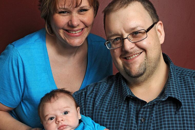 Marybeth Scheidts and David Levy with son Connor, 7 weeks old. They were the first couple to use an experimental test. CLEM MURRAY / Staff Photographer