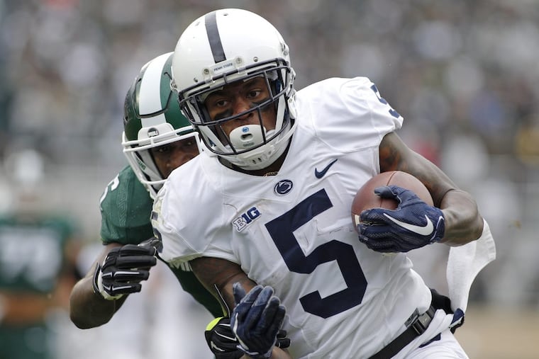Penn State receiver DaeSean Hamilton (5) gets away from Michigan State safety David Dowell (6) for a 31-yard touchdown during the first quarter of an NCAA college football game, Saturday, Nov. 4, 2017, in East Lansing, Mich. (AP Photo/Al Goldis)