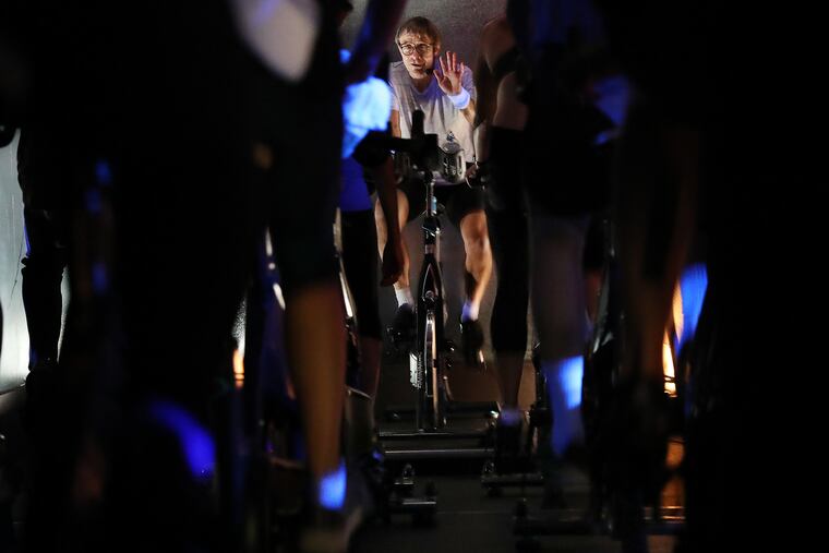 Steve Schatz leads a classical music spin class at the City Fitness Graduate Hospital location.