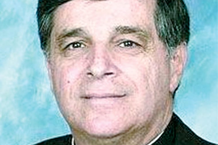 Undated photo of Monsignor Joseph L. Logrip.