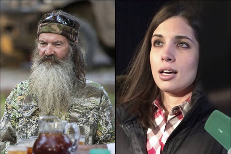 Defenders of 'Duck Dynasty's' Phil Robertson claim he's being punished by A&E for speaking his mind. Meanwhile, a member of the outspoken Russian punk band Pussy Riot, Nadezhda Tolokonnikova (right), was released Monday from prison in Krasnoyarsk, Russia. (AP Photo/Alexander Roslyakov)