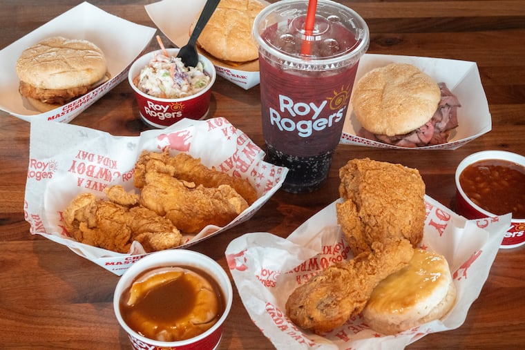 An array of Roy Rogers food at the Cherry Hill location: fried chicken, tenders, the Gold Rush chicken sandwich, roast beef sandwich, coleslaw, mashed potatoes, and baked beans.
