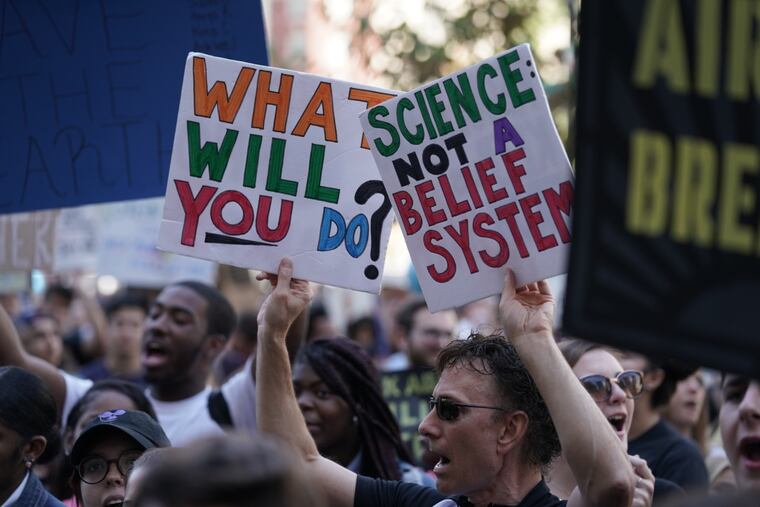 Protestors Gather at City Hall for a climate change protest, in Philadelphia, September 19, 2019. Staff Photographer / JESSICA GRIFFIN