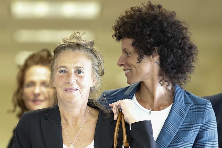 Gianna Constand, left, and her daughter Andrea Constand, right, walk toward the courtroom inside the Montgomery County Courthouse in Norristown, PA on June 12, 2017. Cosby is on trial for sexual assault. Both women testified in the trial.