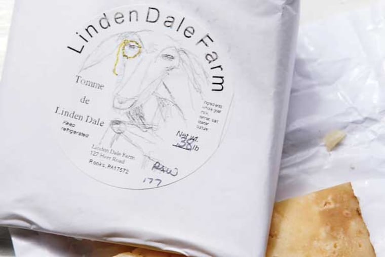 Tomme de Linden Dale, a hand aged natural goat cheese from Linden Dale Farm. ( MICHAEL S. WIRTZ / Staff Photographer )