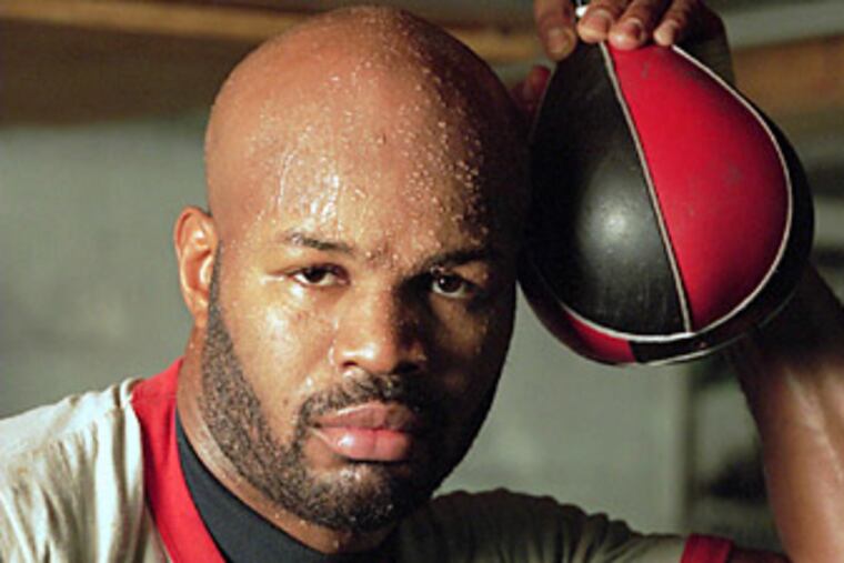 Tony Thornton poses with a speed bag after a workout at the
Front Street Gym in Philadelphia Friday, Jan.13,1995.