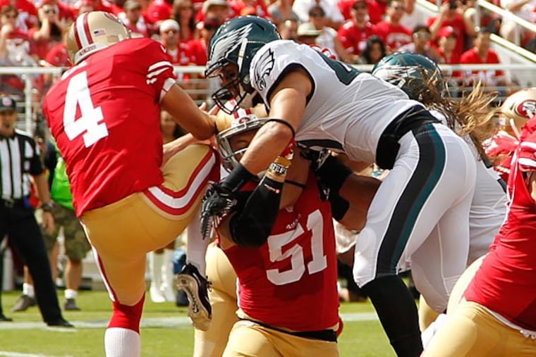 The Eagles block the punt of the 49ers' Andy Lee and recovered it into the end zone. (Ron Cortes/Staff Photographer)
