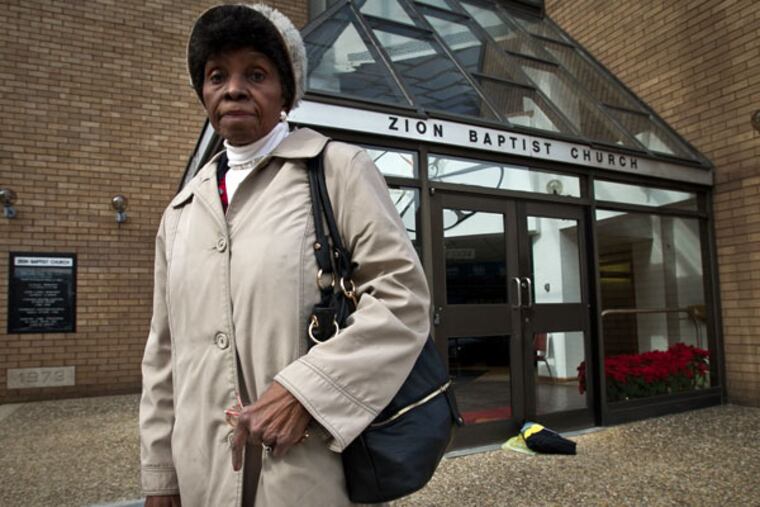 Anita Chappell, a member of Zion Baptist Church, in front of the church on Feb. 5, 2015. She is against the $18 million development plan that has divided the congregation. ( ALEJANDRO A. ALVAREZ / Staff Photographer )