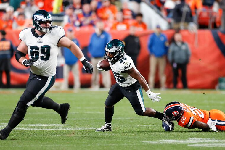 Boston Scott running with the football against the Denver Broncos on Sunday.