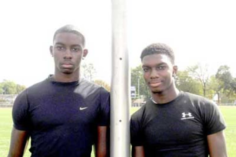 Twins Derrell Lane (left) and Terrell Lane have helped Highland to a 3-2 record and into position for the program's first winning season since 1993. Derrell Lane leads the Tartans in tackles and interceptions, and Terrell Lane is averaging 8.9 yards per carry. ( Phil Anastasia / Staff Photographer )