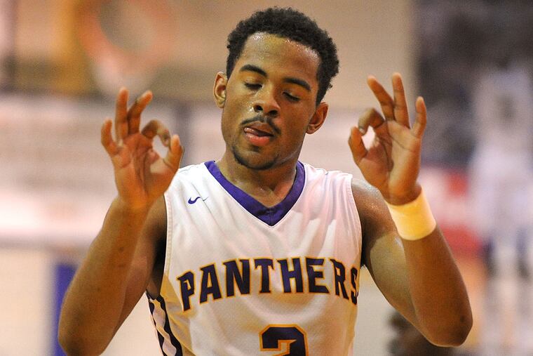 Camden's Corey Greer celebrates drawing a shooting foul.