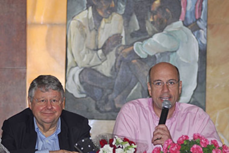 In this file photo, James S. Simpson, right, speaks during a press conference in Hyderabad, India in 2008. (AP Photo/Mahesh Kumar A.)