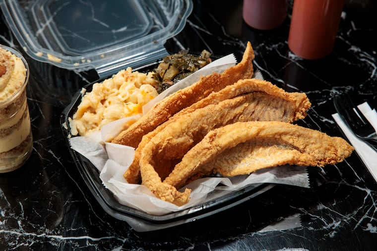The fried Whiting with mac and cheese and greens at Nana’s Good Eats on Thursday, June 11, 2026 in Atlantic City, NJ.