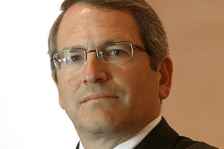 Neil D. Theobald is considered an expert in both education and finance. He meets with Temple students and faculty today.