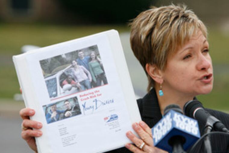 Catherine Rossi of AAA Mid-Atlantic talks about the results of the public-opinion poll. She is holding the organization's booklet "Reducing Risks for Young Drivers."