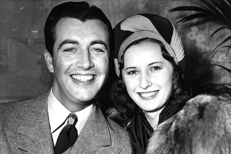 Barbara Stanwyck with Robert Taylor, her second husband, at a press reception at the Victor Hugo Restaurant, newly married and just back from San Diego, April 14, 1939. “Here I am married today,” said Bob, "and tomorrow I’ve got to be back at work making love to another woman, Hedy Lamarr.” From “A Life of Barbara Stanwyck: Steel-True 1907-1940” by Victoria Wilson.