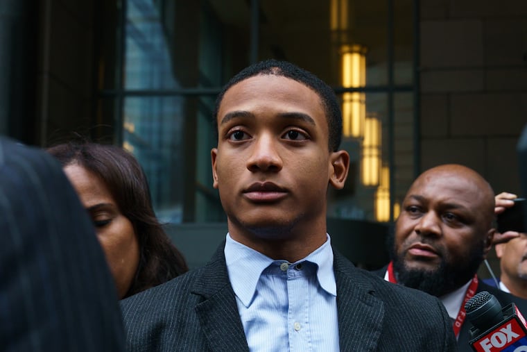 Michael White leaves the Stout Center for Criminal Justice after he was found not guilty in the stabbing death of Sean Schellenger.