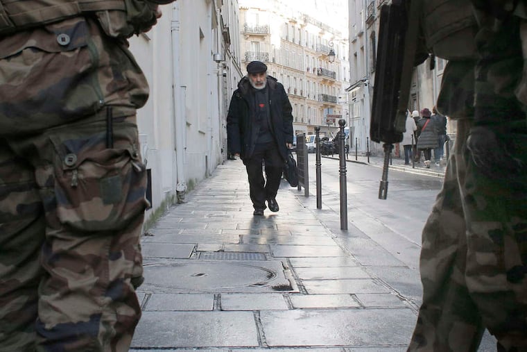 France ordered 10,000 troops into the streets Monday to protect sensitive sites - nearly half of them to guard Jewish schools.