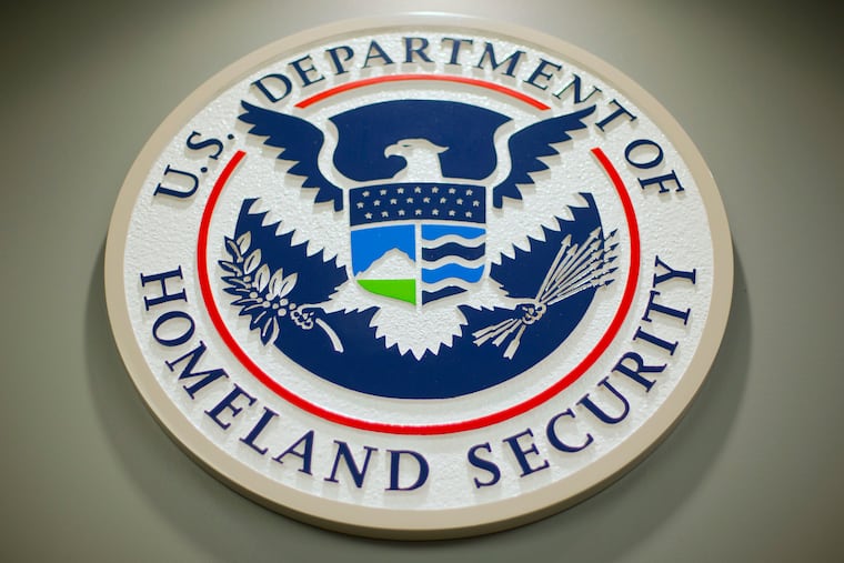 The Department of Homeland Security logo is seen during a news conference in Washington, Feb. 25, 2015. DHS says a looming Supreme Court decision on abortion, an increase of migrants at the U.S.-Mexico border and the midterm elections are potential triggers for extremist violence over the next six months. DHS said June 7, 2022, in the National Terrorism Advisory System bulletin the U.S. was in a "heightened threat environment" already and these factors may worsen the situation.