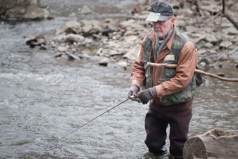 John Jones , of Springfield, Delaware County, gets into the spirit of spring, trout fishing in Ridley Creek at Ridley Creek State Park.