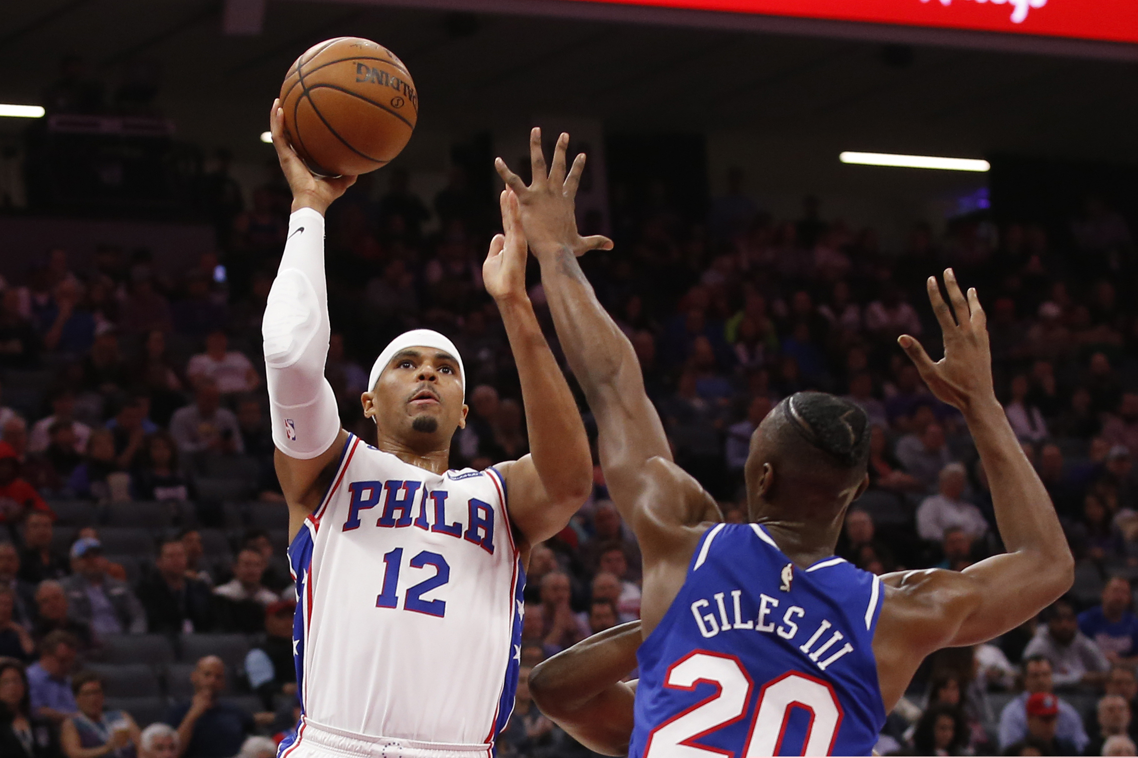 Philadelphia 76ers forward Tobias Harris, left, to give back to the Philadelphia community.