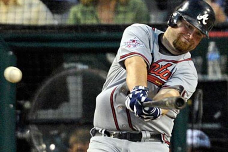 The Braves' Brian McCann, who hit the game-winning three-run double for the NL, said Charlie Manuel inspired him. (AP Photo / Jae C. Hong)