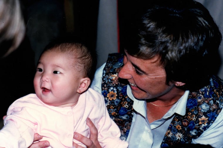A photo of the author and her adoptive mother, Susan T. Buse of Indiana, around the time of her adoption, 1985.