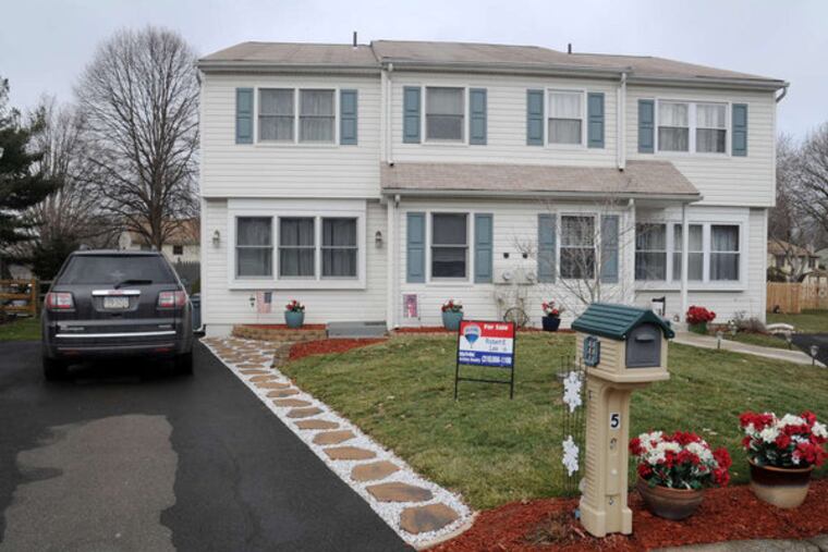 On Horseshoe Circle, a three-bedroom townhouse is selling for $253,000. ( CLEM MURRAY / Staff Photographer )