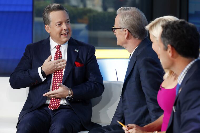 Fox News Chief National Correspondent Ed Henry (left), seen here on "Fox & Friends" back in 2019, has been fired by the network.