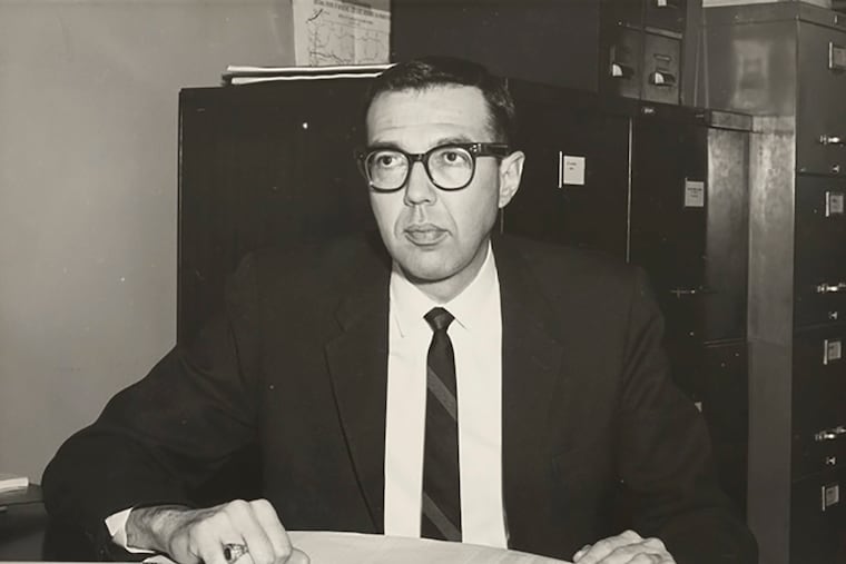 In this photo provided by the LGBT Center of Central PA History Project Collection at the Dickinson College Archives and Special Collections, Richard Schlegel is seen in his office at the Pennsylvania Department of Highways. Pennsylvania's historic preservation agency has removed a roadside marker that was installed in 2021 to honor Schlegel, a gay rights pioneer, after a state senator raised concerns about his 30-year-old remarks sympathetic to pedophilia.