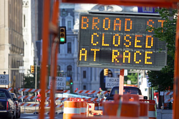 Broad Street is now closed at Race St. to City Hall. (David Swanson / Inquirer)