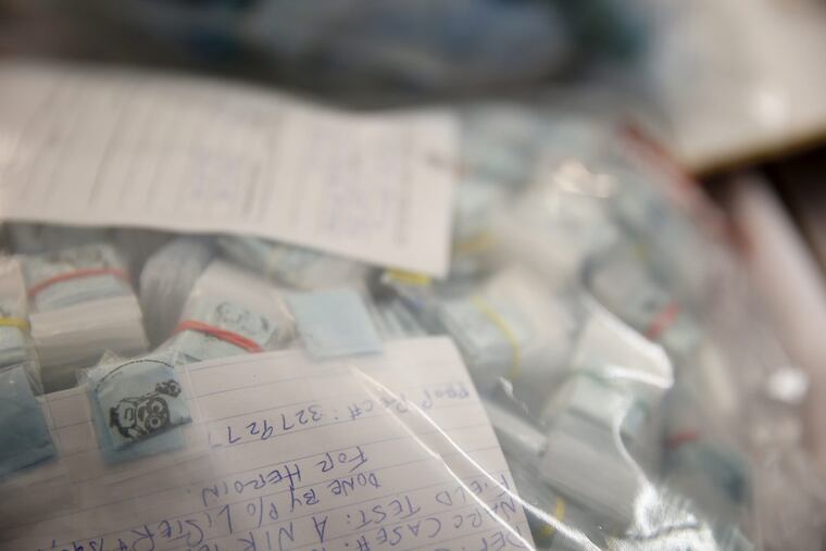 Bags of heroin on display by Philadelphia police after a three-day drug sweep in December.