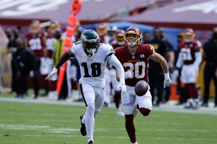 Jalen Reagor said this overthrown pass late in the first half looked like Carson Wentz's fault but was really his. "I slowed down," he said.