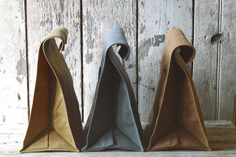 The Marlowe lunchbag and palette and knife. Sold together for $74. Bag comes in slate, spice and tumbleweed. (Photo courtesy Peg and Awl)