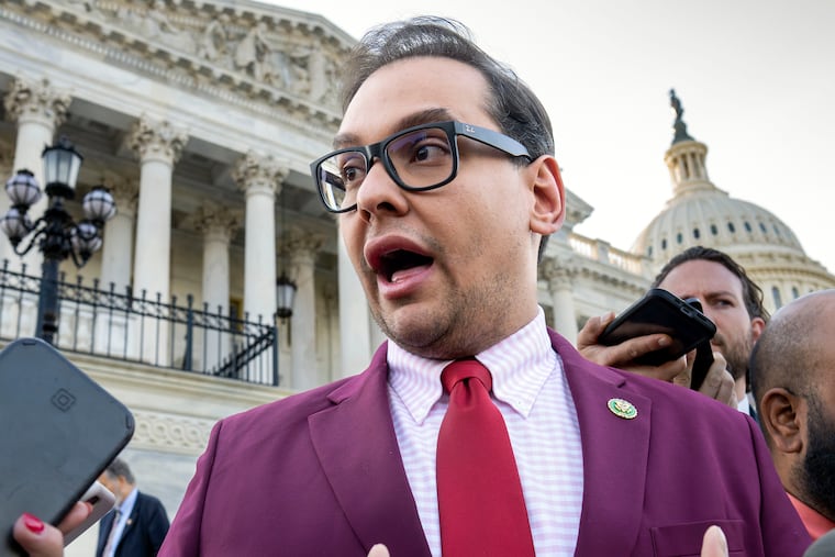 Rep. George Santos, R-N.Y., speaks to reporters outside the Capito. Sam Miele, a former political fundraiser for Santos, was indicted on federal charges Wednesday for allegedly impersonating a high-ranking congressional aide while soliciting contributions for the embattled Republican’s campaign.