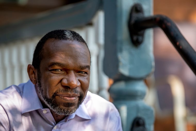 Former City Solicitor Sozi Pedro Tulante poses outside his home June 10, 2020.