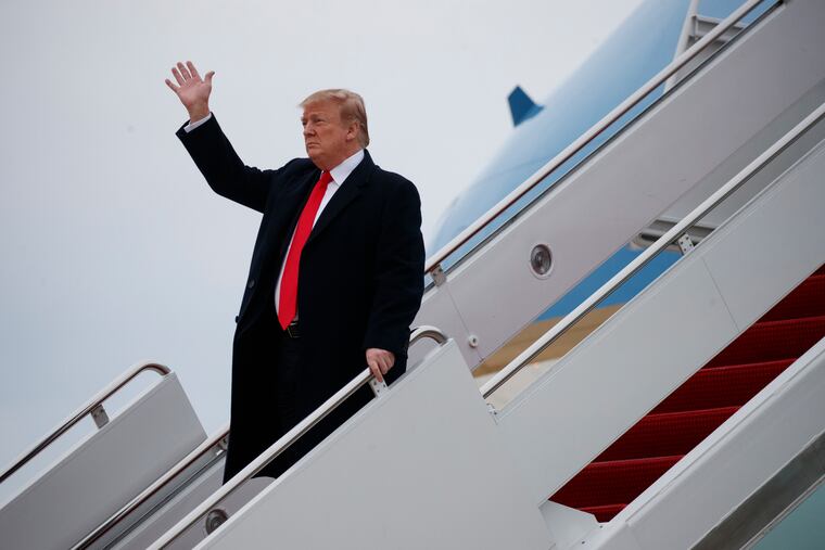 President Donald Trump arrives on Air Force One Sunday at Andrews Air Force Base.
