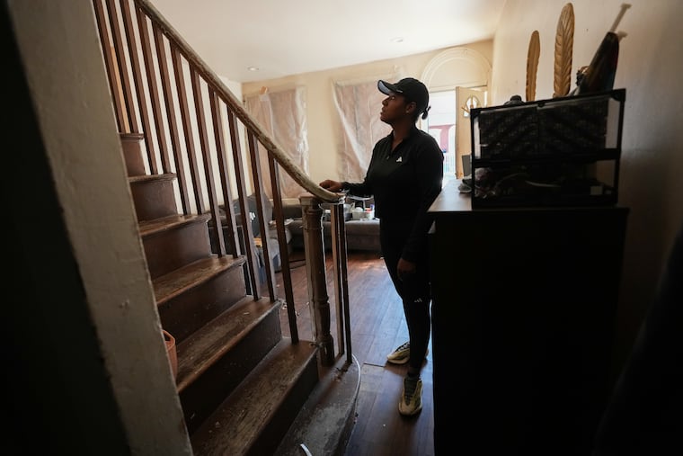 Crystal Hall returns to the house where her mother, Patricia Hall, was killed by her landlord, in East Germantown.