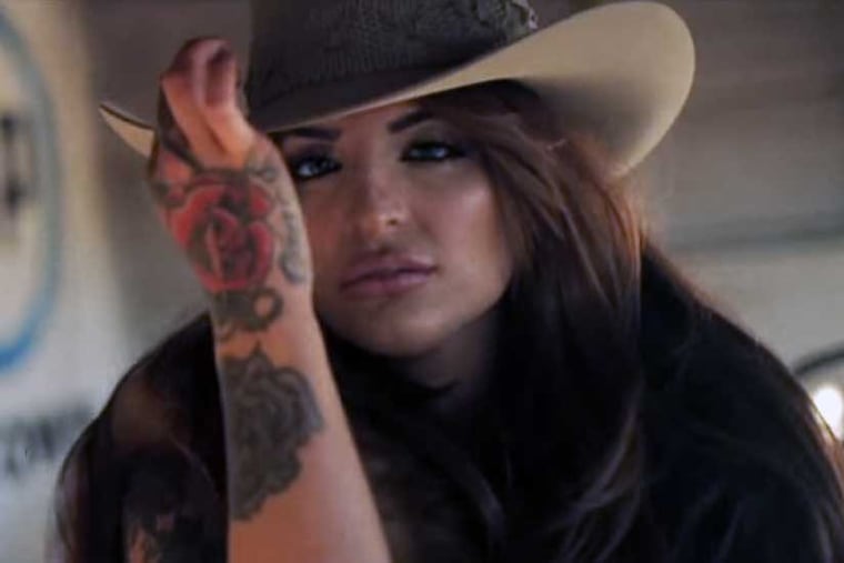 Katie Layne, also known as Katie Quackenbush, in a music video.