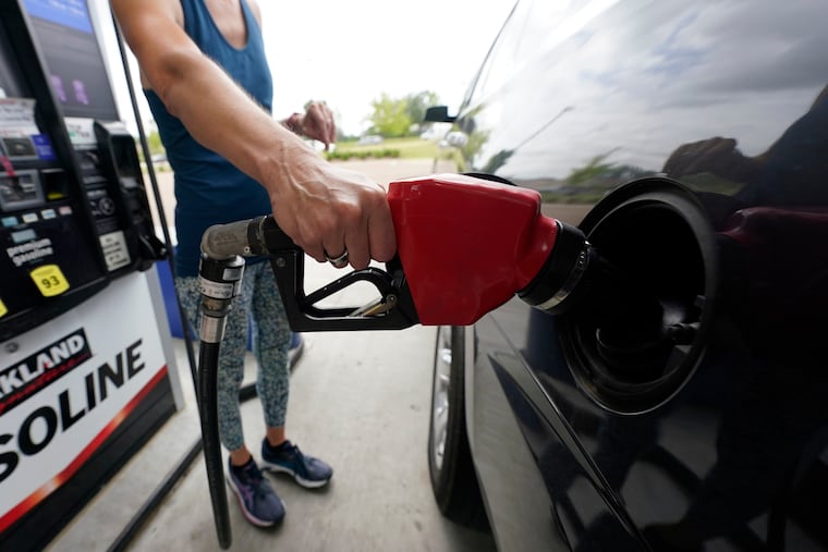 FILE - A customer readies to pump gas at this Ridgeland, Miss., Costco, Tuesday, May 24, 2022.