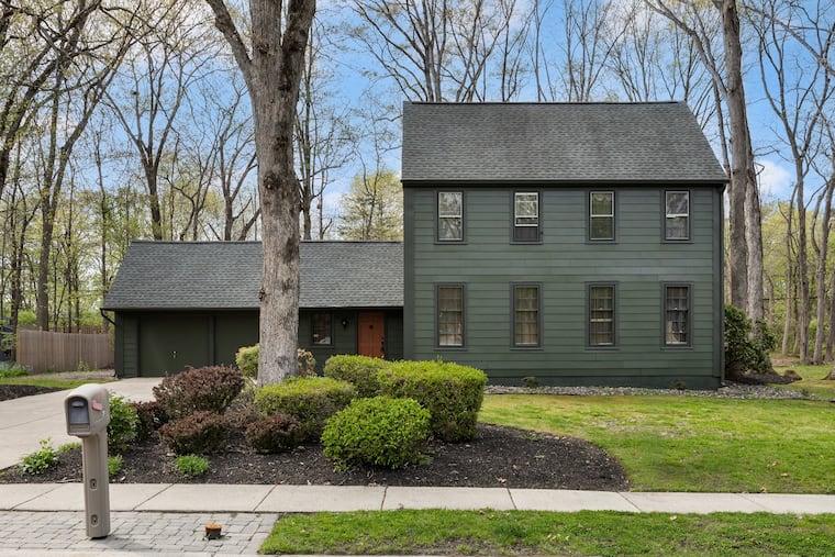 The exterior of the saltbox-style home in Cherry Hill.