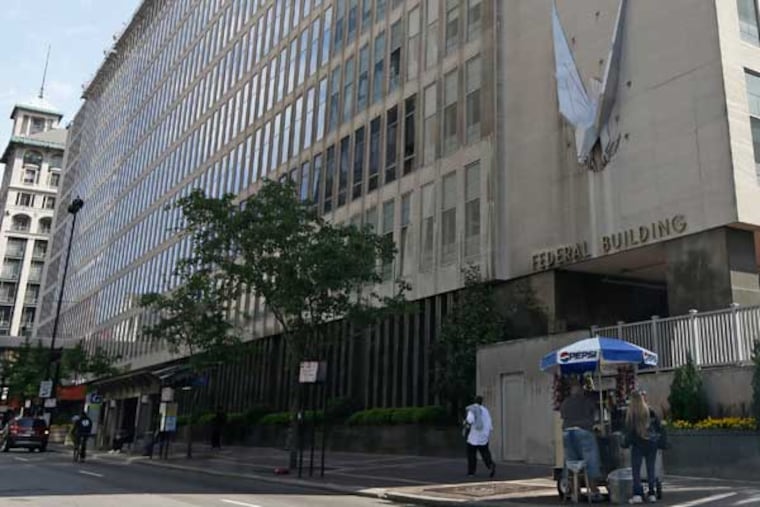 The John Weld Peck Federal Building, shown Tuesday, May 14, 2013, in Cincinnati, houses the main offices for the Internal Revenue Service in the city. The IRS apologized Friday for what it acknowledged was "inappropriate" targeting of conservative political groups during the 2012 election to see whether they were violating their tax-exempt status. In some cases, the IRS acknowledged, agents inappropriately asked for lists of donors. The agency blamed low-level employees in a Cincinnati office, saying no high-level officials were aware. (AP Photo/Al Behrman)