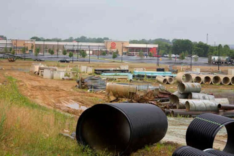 Only a Wegmans market and a Target store have been built at J. Brian O'Neill's still largely undeveloped Uptown Worthington project in Malvern. O'Neill has sued Citizens Bank over what he calls broken financial promises. The bank says his claims have no basis in reality.