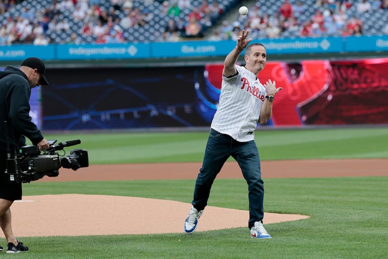 Eagles GM Howie Roseman throwing out the ceremonial first pitch before the Atlanta Braves played the Phillies on Tuesday night.