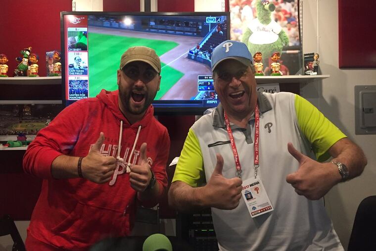 97.5 The Fanatic morning host Marc Farzetta (left), seen here alongside his former boss, 94.1 WIP's Angelo Cataldi. Farzetta, who took over The Fanatic's morning show on Oct. 8, has a long way to challenge his former colleague's ratings supremacy.