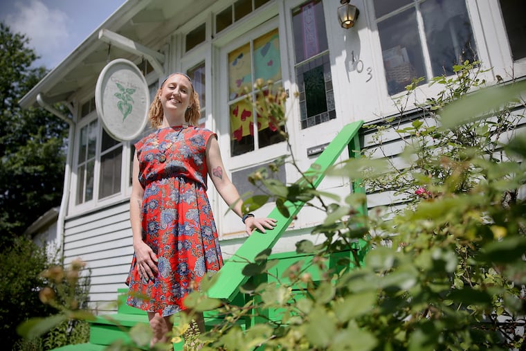 Christina McLean stands outside her home in Collingswood. She said she received a cease and desist letter from the township in April.
