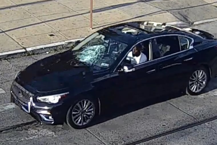 Police say a man driving this black Infiniti struck and killed a 77-year-old woman at 54th Street and Lancaster Avenue on Friday.