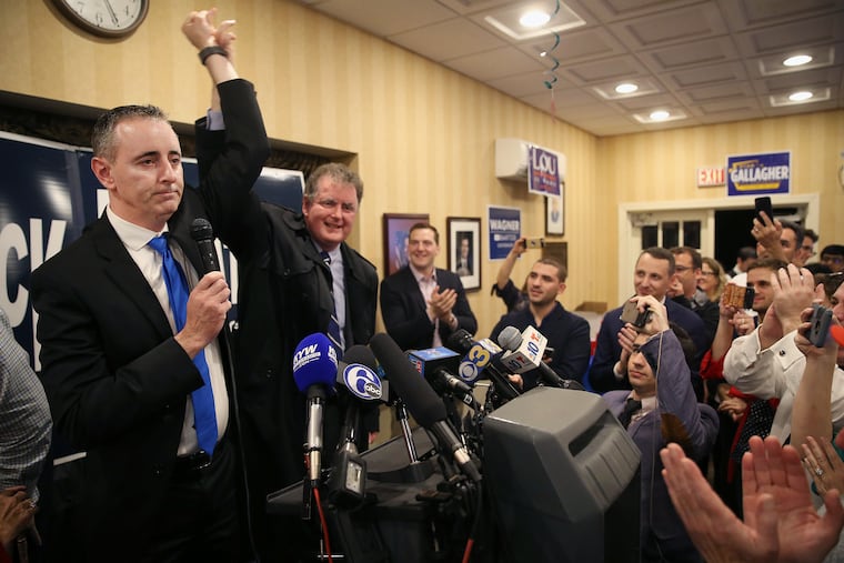 Rep. Brian Fitzpatrick, left, celebrates his re-election with his brother, former congressman Mike Fitzpatrick at the Bucks County GOP watch party in Doylestown, Par